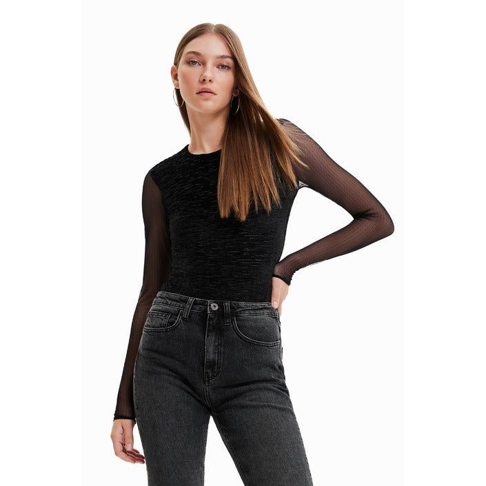 Woman in Urban City Styles black top and jeans