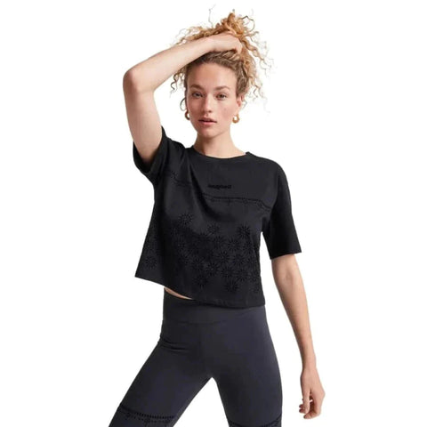 Woman in black yoga pants and crop top - Urban City Styles