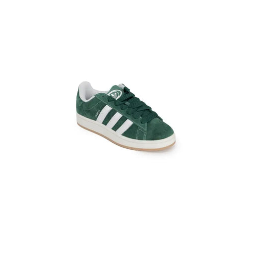 Green adidas gazelle sneakers with white stripes and gum soles.