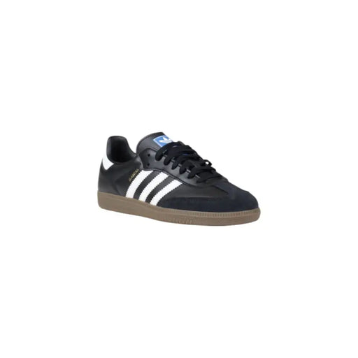 Adidas Herren-Sneaker aus schwarzem Leder mit weißen Streifen, hellbrauner Gummisohle und schwarzen Schnürsenkeln – ideal für Frühling und Sommer.