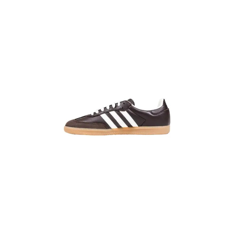 Brown leather adidas samba sneaker with white stripes and gum sole.