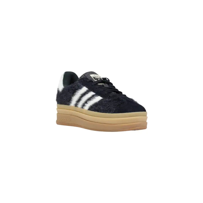 Black Adidas Originals women’s leather sneakers with white stripes and fuzzy upper