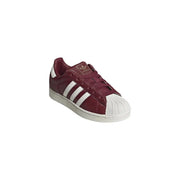 Adidas Originals women leather slip on sneaker in bordeaux with maroon suede, white rubber toe cap, and three stripes