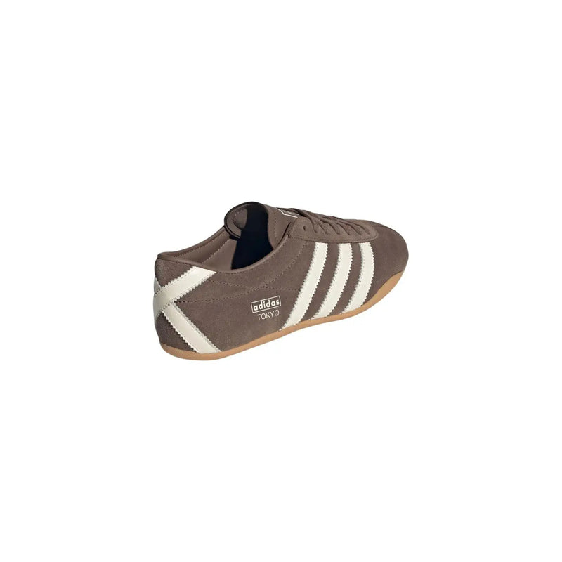 Adidas Originals women suede sneakers brown featuring brown suede upper with three white stripes and tan rubber sole