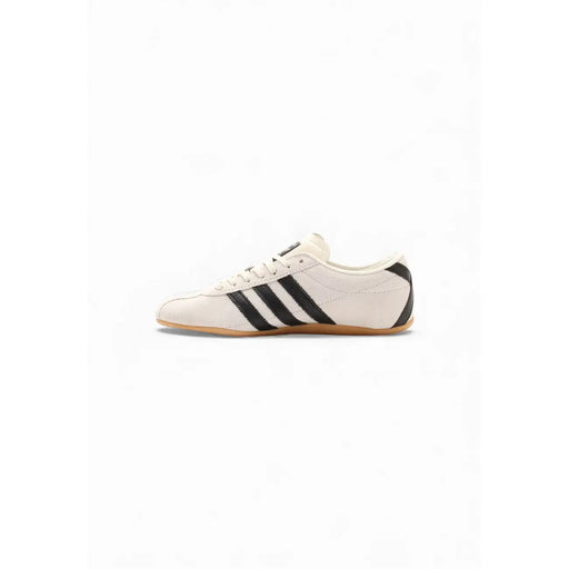 Cremefarbene adidas Originals Damen-Sneaker aus Wildleder mit schwarzen Zierstreifen und beiger Gummisohle