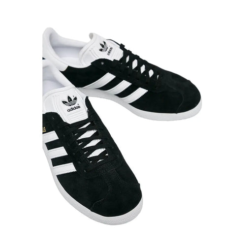 Adidas Schwarze Damen-Sneaker aus Wildleder mit weißen Gummisohlen und Polyurethan-Schnürung mit drei Streifen