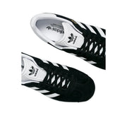 Adidas women black sneakers polyurethane lace up with black and white suede upper and three stripes side design