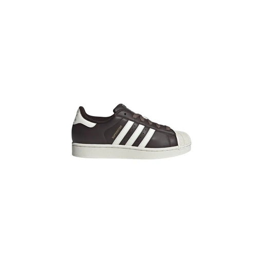 Adidas Schwarzer Damen-Sneaker aus Leder im Superstar-Stil mit weißer Zehenkappe aus Gummi und drei Streifen.