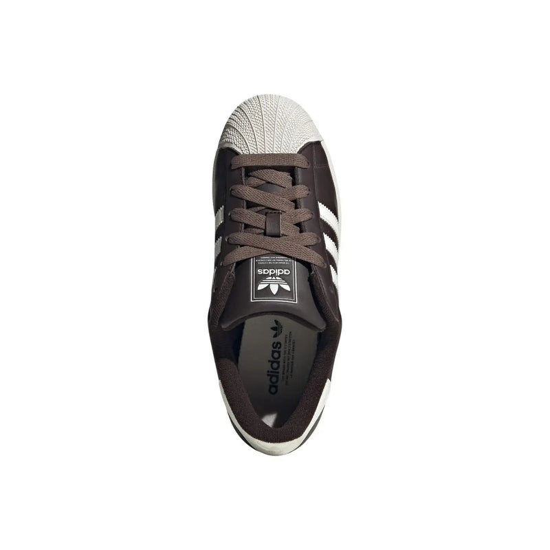 Adidas women leather superstar sneaker in brown with white rubber toe cap and three stripes design