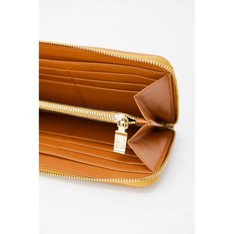 Alviero Martini Prima Classe Damen-Geldbörse aus hellbraunem Leder mit goldfarbenem Reißverschluss und beigem Zipper.