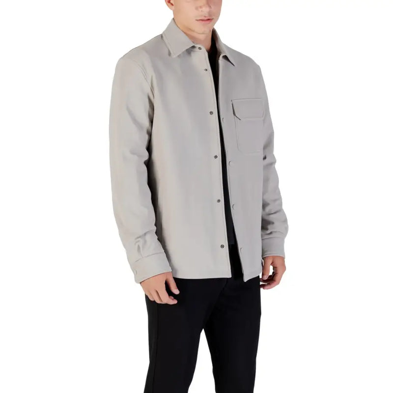 Men’s light grey long sleeve button-up collared shirt with chest pocket from Antony Morato