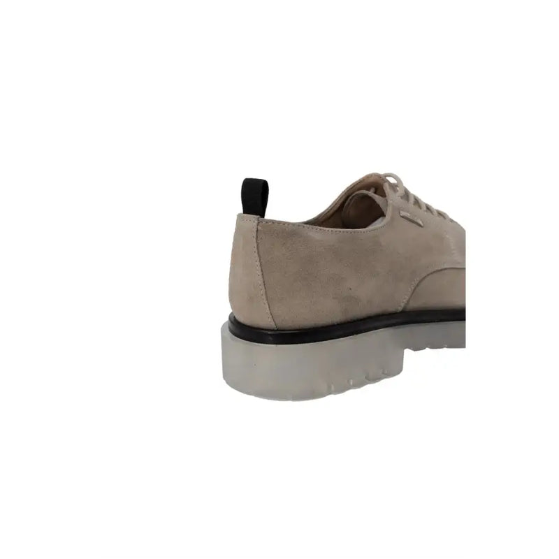 Antony morato men beige leather lace-up shoe with chunky translucent sole and black rubber heel strip shown from back