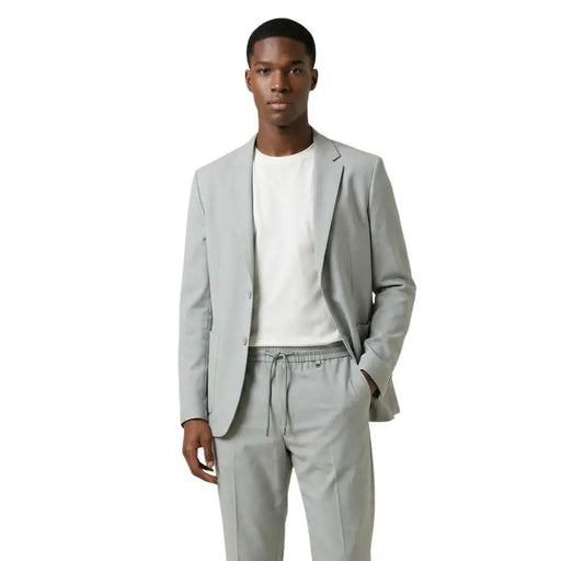 Light gray Antony Morato men polyester blazer with single button closure and notched lapels tailored for formal use