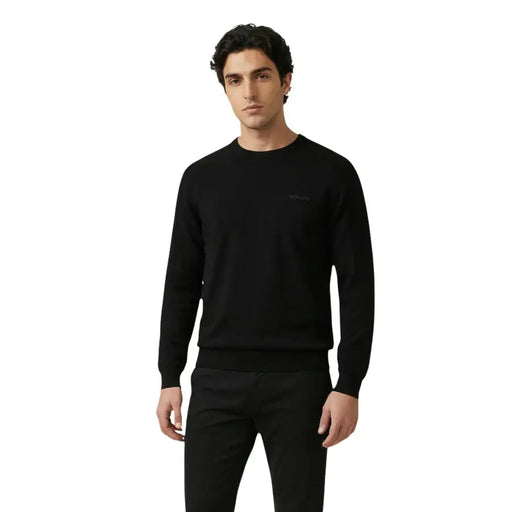 Antony Morato Schwarzer Herren-Strickpullover aus Baumwolle mit langen Ärmeln und Rundhalsausschnitt sowie dezentem, gesticktem Logo auf der linken Brust.