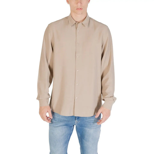 Beige Antony Morato men shirt with long sleeves, classic collar, button-down front, and subtle textured fabric