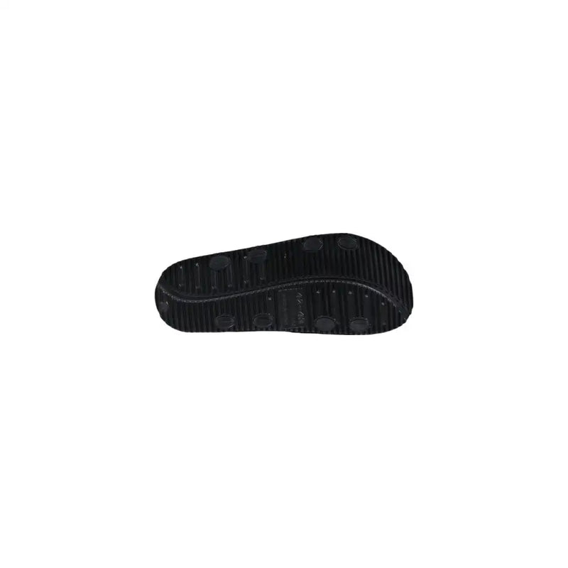 Schwarze Gummisohle mit strukturiertem Griffmuster und kreisförmigen Vertiefungen antony morato Herren-Slipper Kry schwarze Sandalen