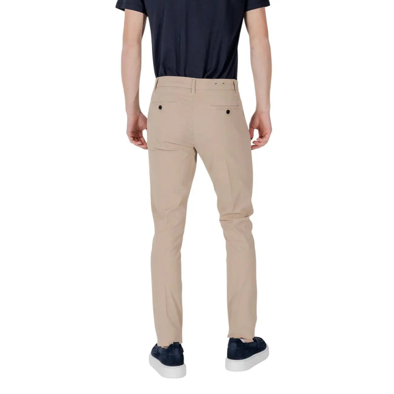 Beige slim fit chino trousers with black buttoned back pockets shown from the back by antony morato men trousers