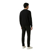 Antony Morato men trousers paired with a black crewneck sweater featuring long sleeves and a smooth fitted silhouette