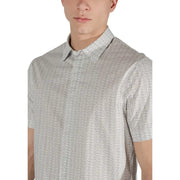Men’s beige short-sleeved button-down shirt with subtle geometric pattern by Armani Exchange