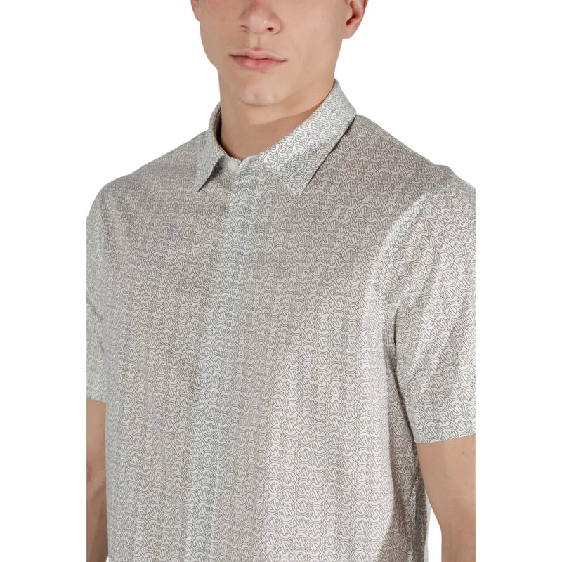Light gray short-sleeved polo shirt with subtle repeating monogram pattern from armani exchange beige geometric collection