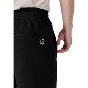 Armani Exchange black cotton blend sweatpants with white embroidered logo on front pocket for everyday wear
