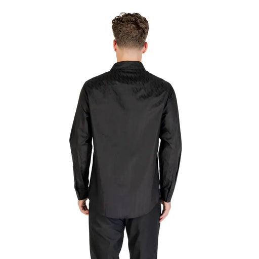 Men’s black long-sleeved button-up shirt and trousers from Armani Exchange