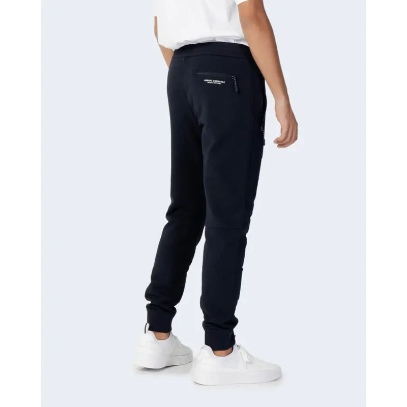 Men’s navy blue cotton joggers with white sneakers from Armani Exchange for fall winter collection
