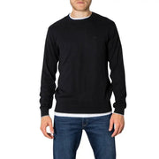 Black crew neck sweater over white undershirt from Armani Exchange Men Knitwear