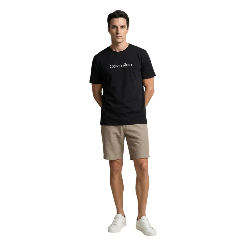 Calvin Klein t-shirt Herrenanzug in Schwarz mit weißem Logo auf der Brust, Vorderansicht