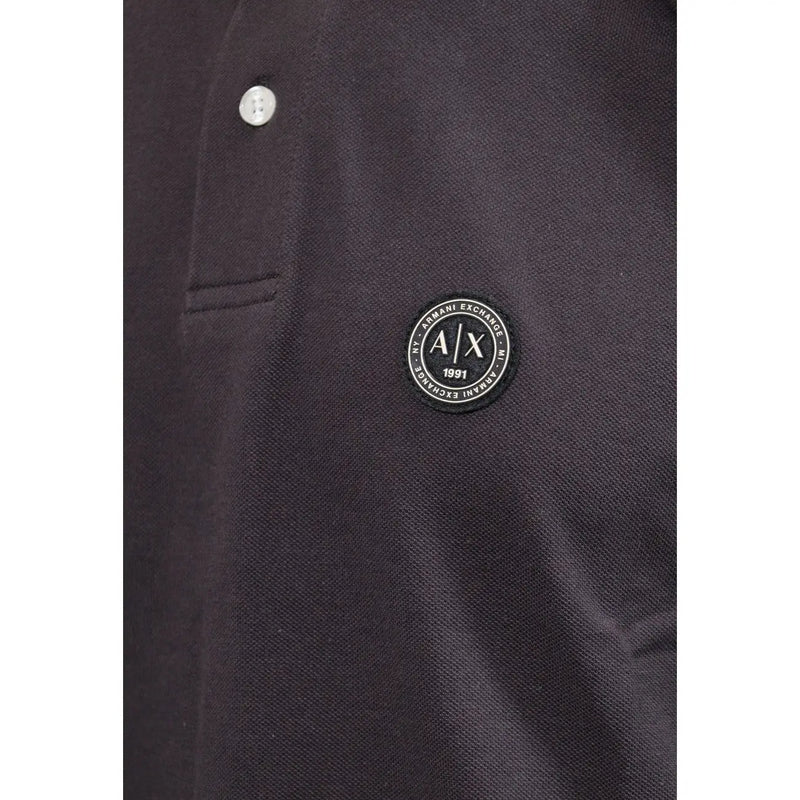Armani Exchange Schwarzes Langarm-Polohemd für Herren mit rundem Logo-Patch, Vorderansicht