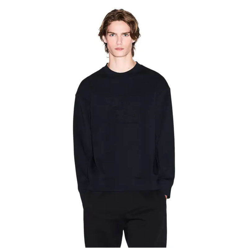 Armani exchange Schwarzes Herren-Sweatshirt aus Baumwolle im Oversize-Stil mit Rundhalsausschnitt, dezenter Vordertasche und lockerer Passform
