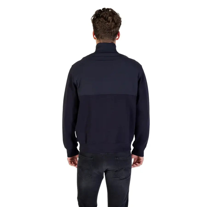 Armani Exchange Herrenblazer in Marineblau mit langer, zweifarbiger Fronttasche, Reißverschluss, gerippten Bündchen und Saum.