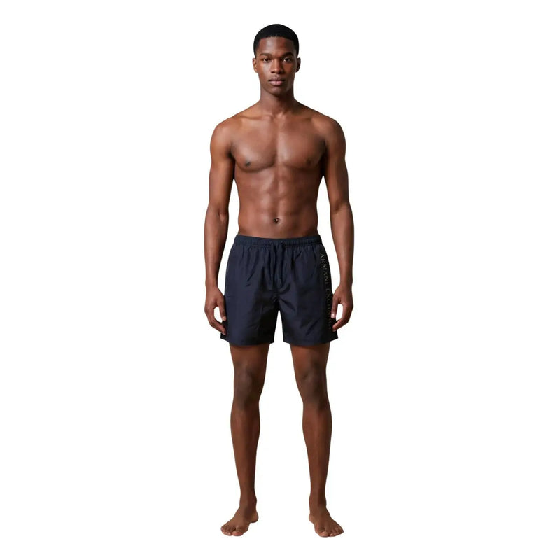 Armani exchange men blue print polyester swimwear shorts in dark navy with subtle vertical logo detail on the side seam
