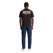Armani Exchange Herren-T-Shirt aus brauner Baumwolle, Rückseite mit schwarzem Stoff und beigefarbenem Aufdruck „Forschungsbezirk“.