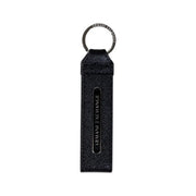 Black textured leather keychain with silver metal ring and embossed armani exchange branding for men leather wallet