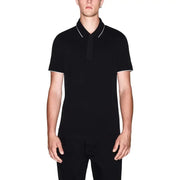 Armani Exchange Schwarzes Herren-Polohemd aus Baumwolle mit kurzen Ärmeln und weißem Besatz an Kragen und Ärmelbündchen, Vorderansicht