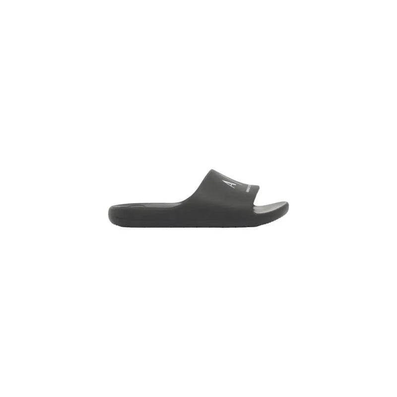 Schwarze Calvin Klein Pantoletten mit minimalistischem Design und dezentem weißen Logo am Riemen für Herren
