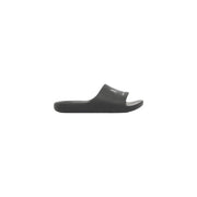 Black calvin klein slide sandal with minimalist design and subtle white logo on strap for men rubber slippers