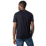 Men’s dark blue short-sleeved cotton T-shirt paired with blue jeans from Armani Exchange