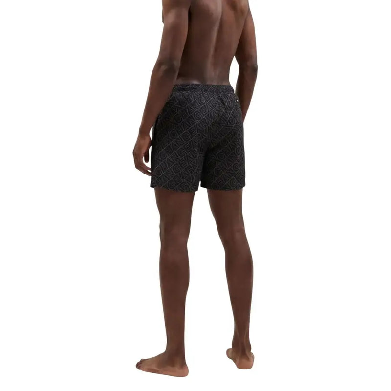 Armani Exchange Schwarze Herren-Badehose aus Polyester mit dezentem, helleren geometrischen Muster für den Strand