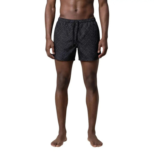 Armani Exchange men swimwear black polyester swim trunks with subtle gray interlocking letter print