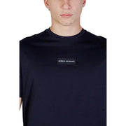 Schwarz armani exchange Männer t-shirt mit einem rechteckigen Logo-Patch auf der Brust aus weichem Baumwollstoff