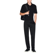Schwarzes, kurzärmeliges Poloshirt mit Kragen und Knopfleiste von armani exchange Herrenhosenkollektion