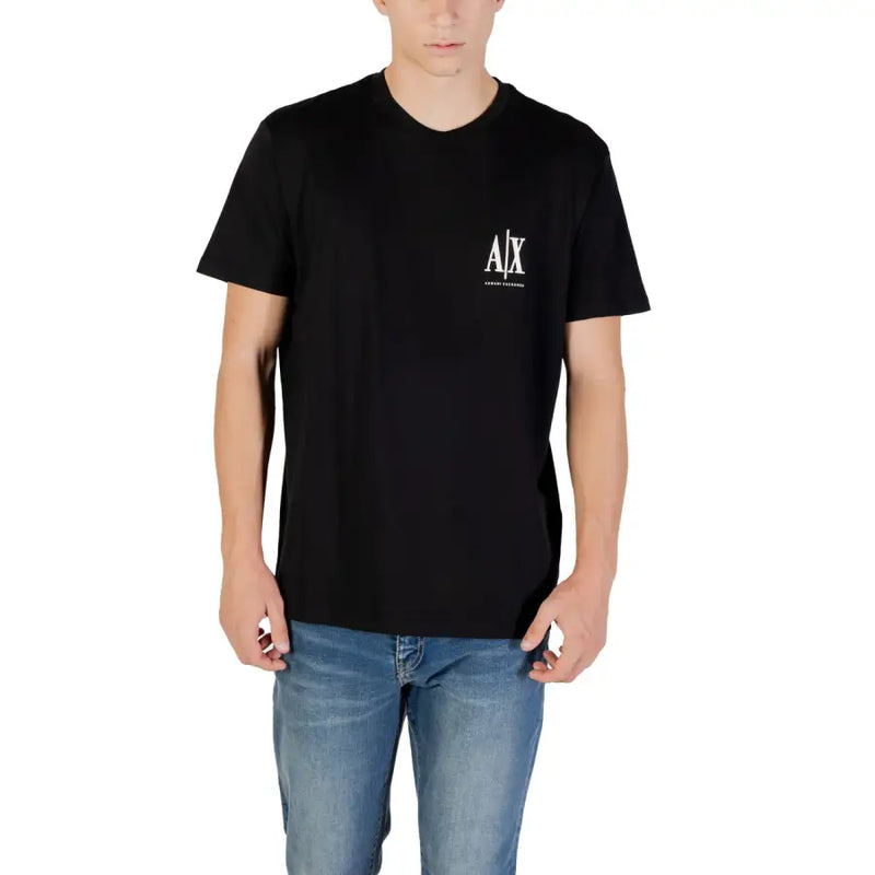 Men’s black short-sleeve T-shirt with white graphic logo paired with blue jeans