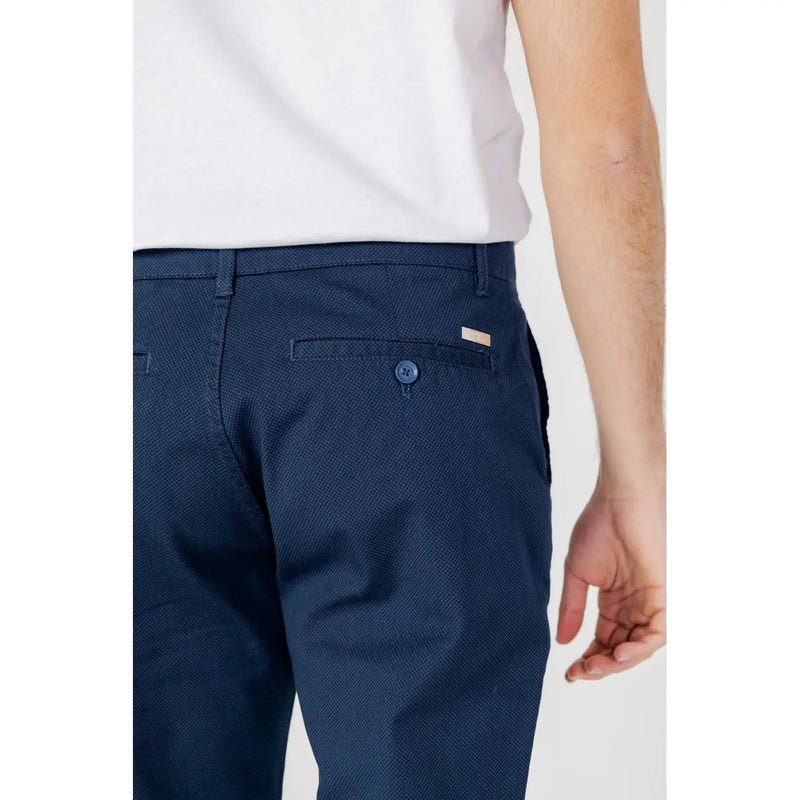Armani Exchange men’s navy blue textured chino pants with subtle woven pattern and brand tag on back pocket