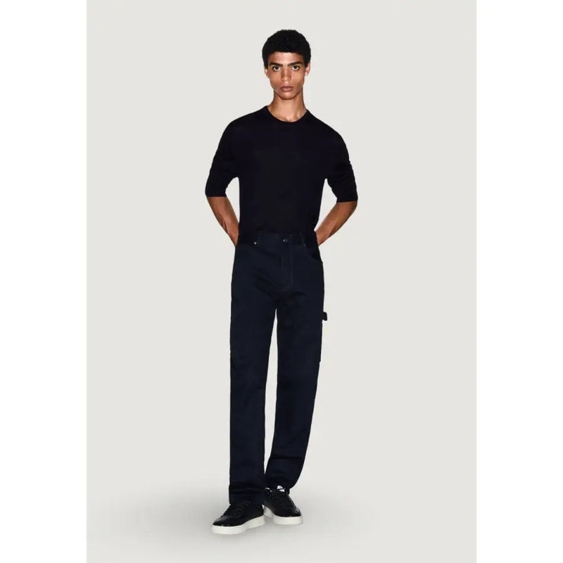 Dark navy blue denim jeans with straight-leg cut and subtle cargo pocket detail paired with armani exchange wool-blend sweater