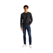 Armani Exchange slim-fit denim jeans for men in dark navy blue with visible front pockets, front view