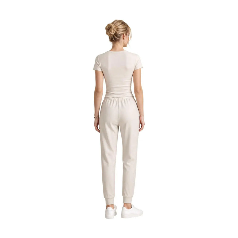 Beigefarbenes Baumwoll-T-Shirt mit kurzen Ärmeln und passender Jogginghose für Damen von Armani Exchange