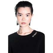 Armani Exchange Schwarzes Damen-T-Shirt aus Baumwolle mit Rundhalsausschnitt und silberner Stickerei an der Schulter