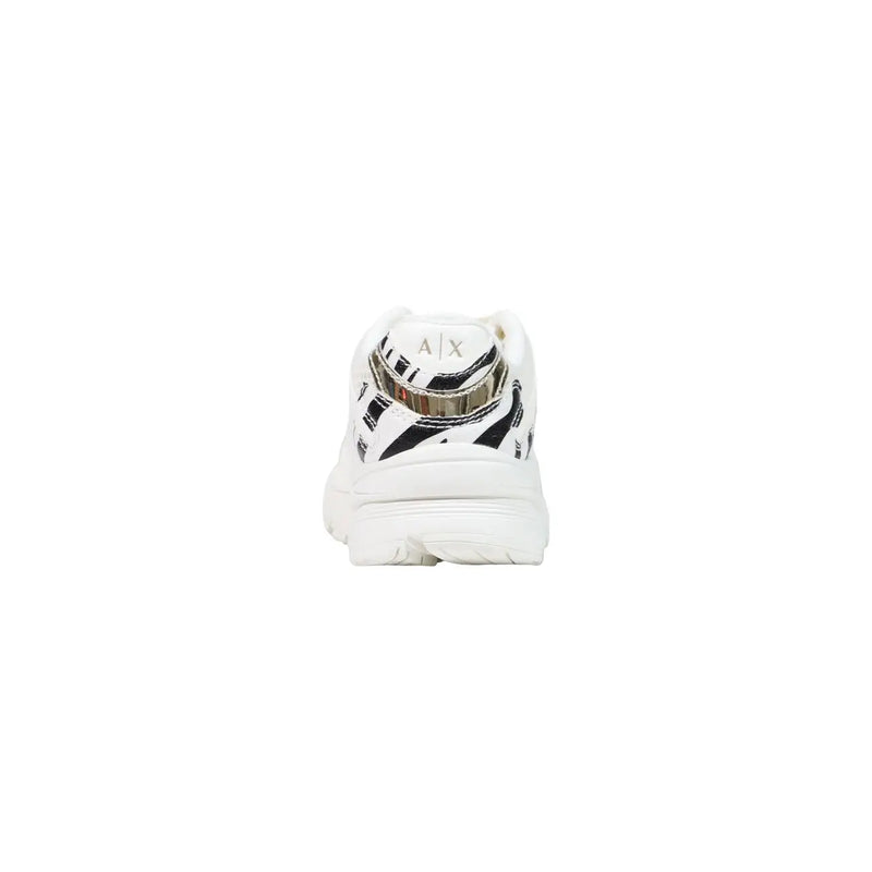Armani Exchange women black slip on sneakers in polyester featuring white with bold black zebra stripes and silver heel band